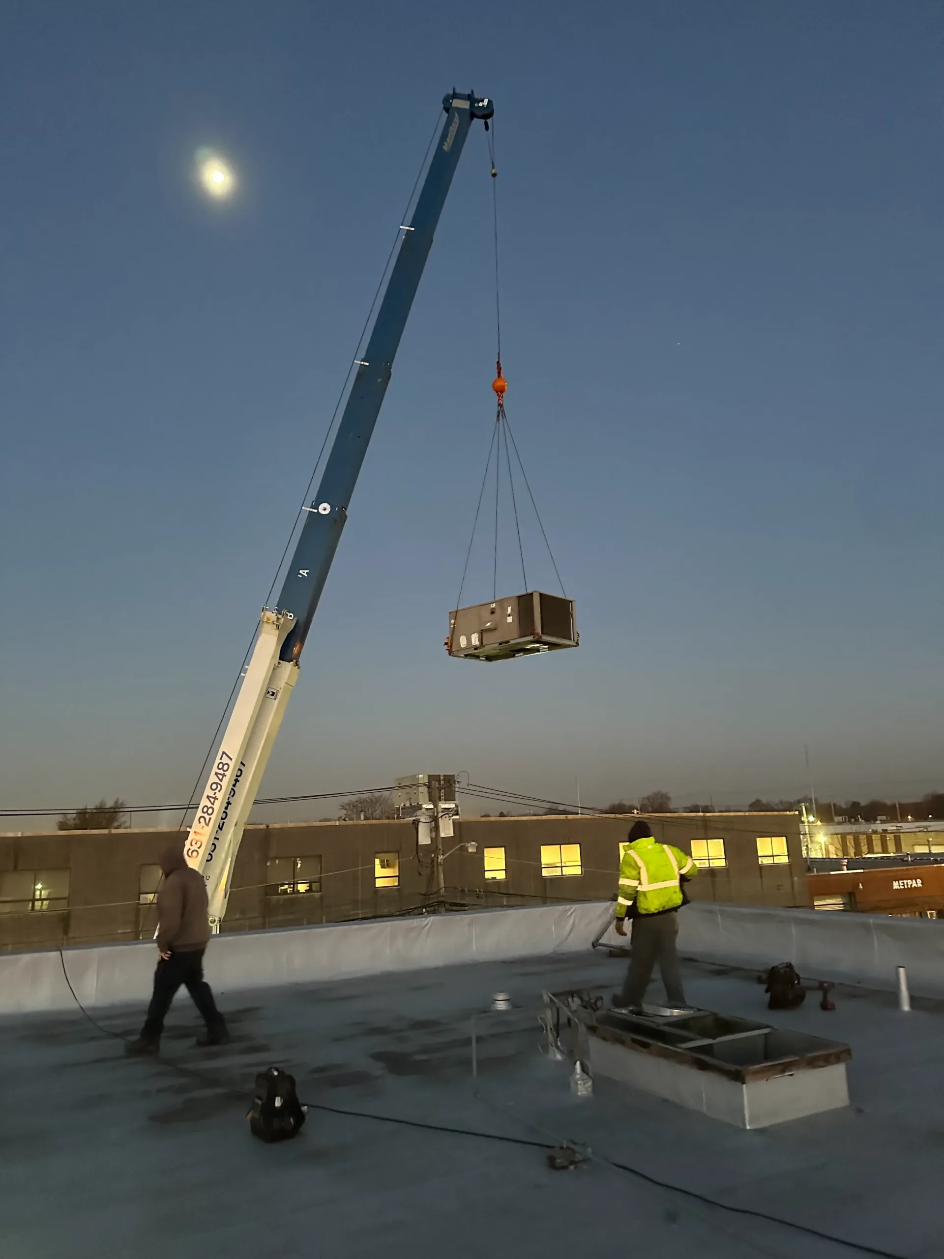 Long Island Climate Control HVAC technician on the job